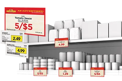 Grocery store shelf with various packages and price tags.